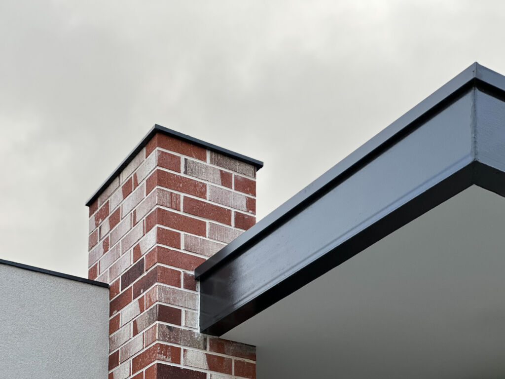 Elevating Your Home's Aesthetic: Incorporating Industrial Design Elements into Your Façade